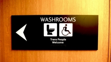 New washroom signage at City Hall welcomes trans* individuals